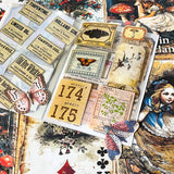 alice in wonderland junk journal kit with vintage botanical scrapbook paper, mushroom labels, insect die cuts and a 20 page clear sticker book
