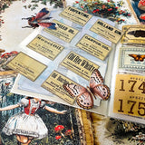 alice in wonderland junk journal kit with vintage botanical scrapbook paper, mushroom labels, insect die cuts and a 20 page clear sticker book