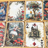 alice in wonderland junk journal kit with vintage botanical scrapbook paper, mushroom labels, insect die cuts and a 20 page clear sticker book