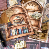 vintage library journaling kit with scrapbook paper, clear stickers, paper ephemera and bookshelf card pieces arranged with black pen on book background