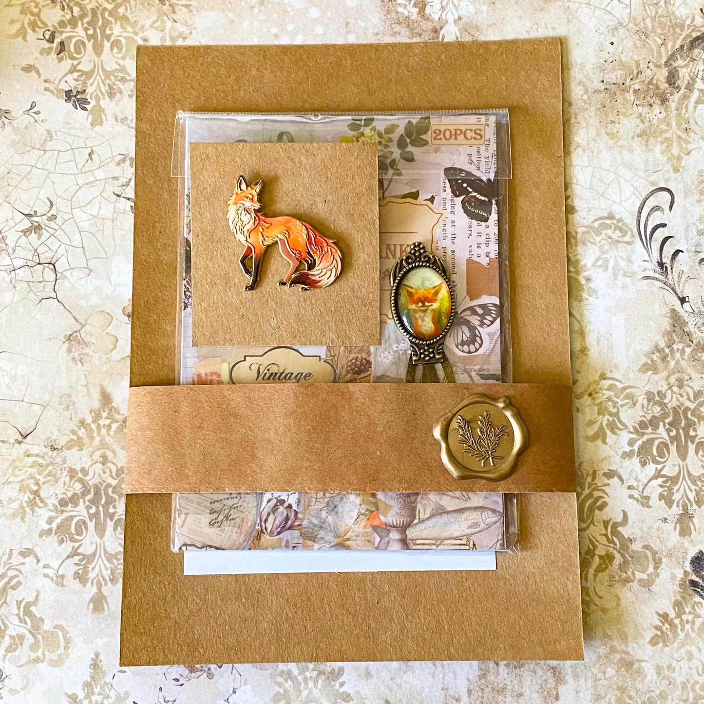 fox woodland letterbox gift set with vintage clear sticker book, botanical stickers, enamel fox pin and antique style fox metal bookmark