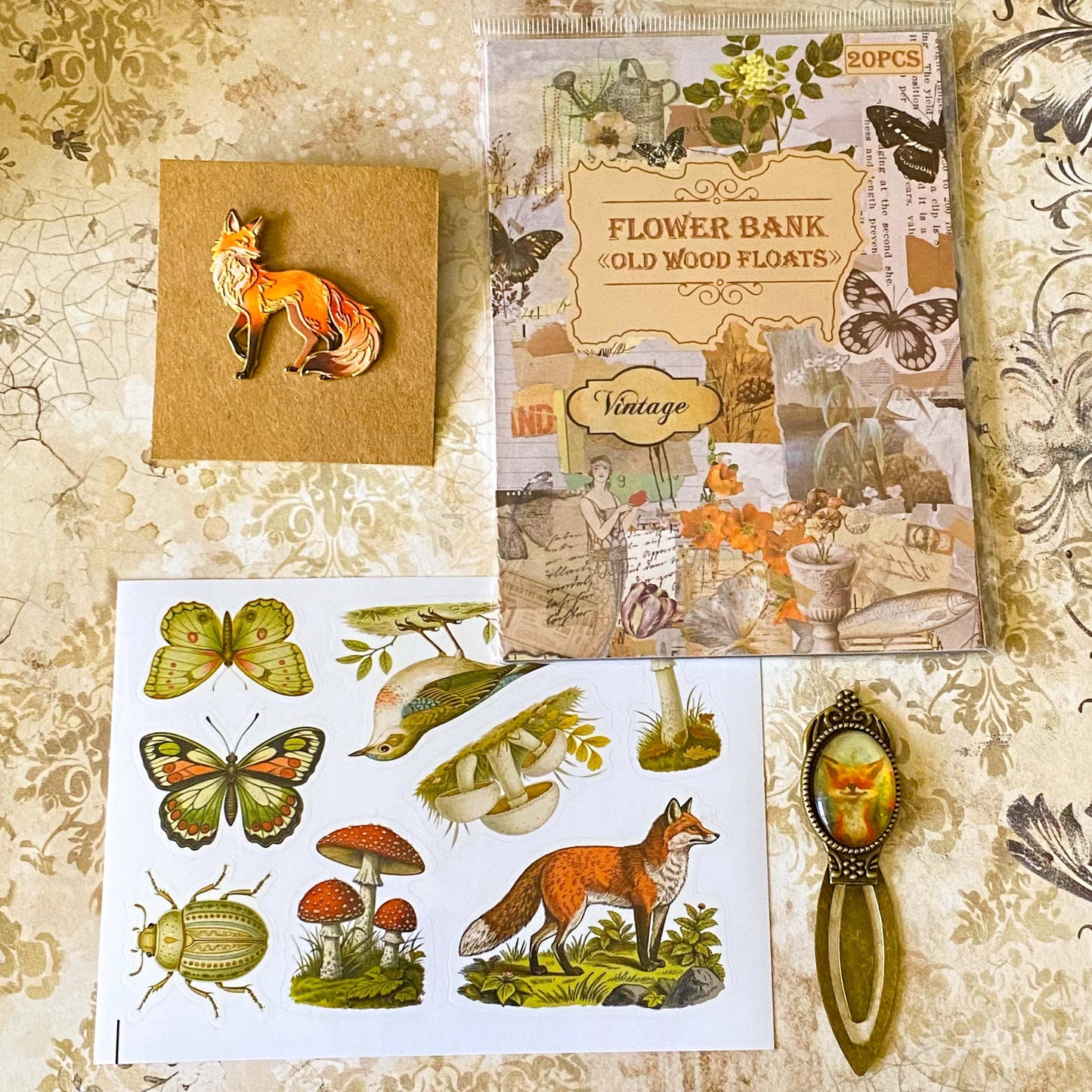 fox woodland letterbox gift set with vintage clear sticker book, botanical stickers, enamel fox pin and antique style fox metal bookmark
