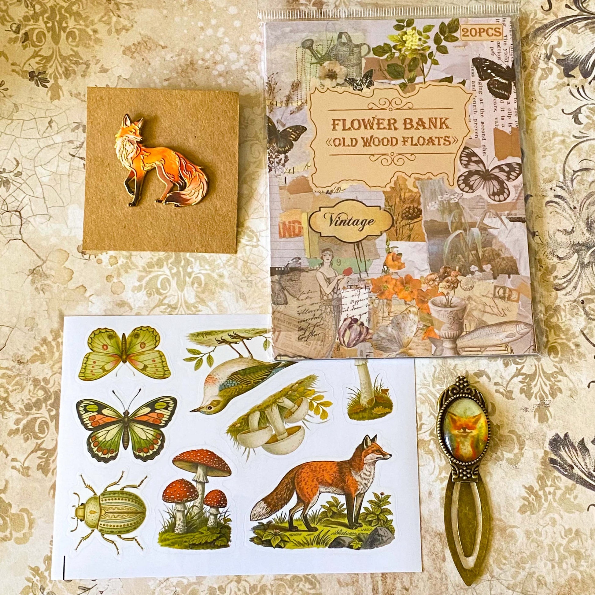 fox woodland letterbox gift set with vintage clear sticker book, botanical stickers, enamel fox pin and antique style fox metal bookmark