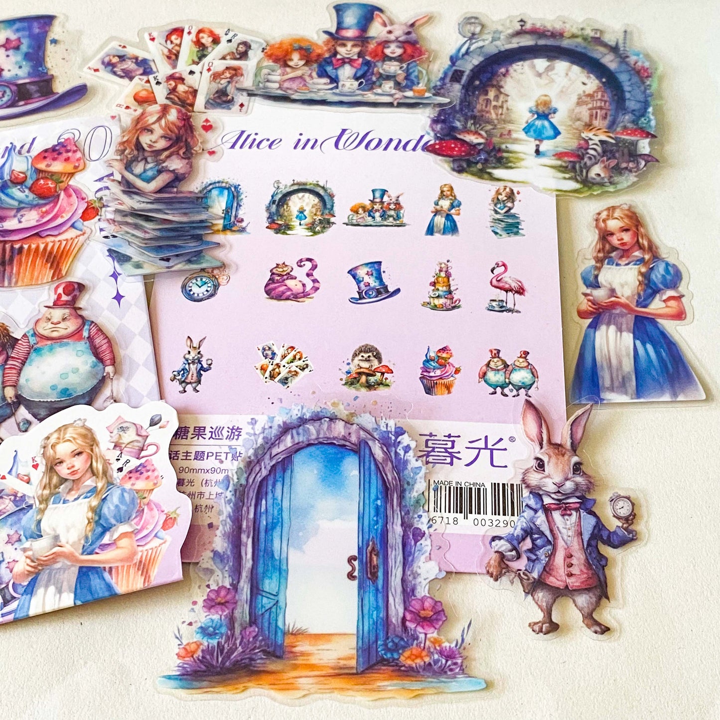 alice in wonderland dream garden clear PET stickers set with 30 large pastel stickers including Alice, White rabbit, Tweedle Dum and Tweedle Dee, playing cards and doorway