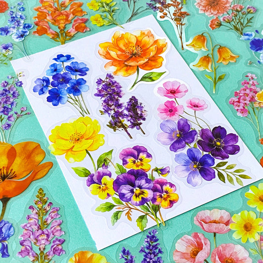 pack of 50 large PET transparent stickers of botanical flowers featuring garden plants in a range of bright colours with daisy, pansy, foxglove, poppy, lupin. uk stationery shop.