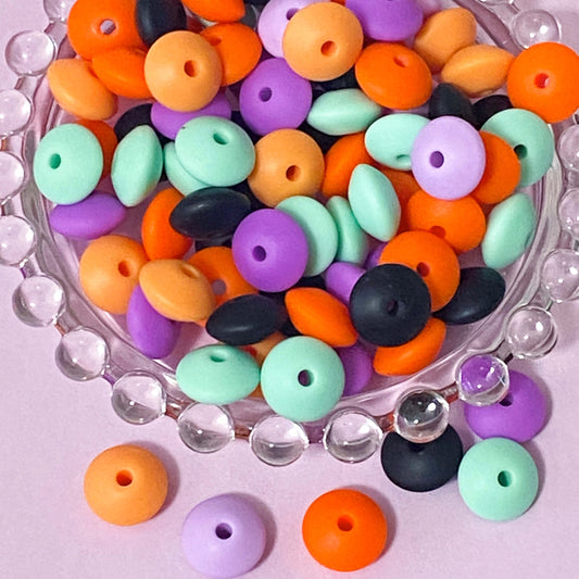 spacer bead beads abacus silicone spacers disc flattened bean beads 12mm by 7mm uk cute kawaii halloween craft supplies crafts shop store mix mixed set bag orange purple black mint green turquoise purple lilac beaded pen pens make your own gift gifts beading jewellery