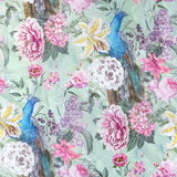 Floral and peacock pattern on a green background