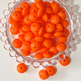 spacer spacers bean beans beads bead abacus disc thin silicone 12mm by 7mm flattened disk small soft uk cute kawaii craft supplies crafts shop store making beaded pen pens jewellery make bright strong orange deep purple dark green blue peacock teal 