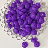 spacer spacers bean beans beads bead abacus disc thin silicone 12mm by 7mm flattened disk small soft uk cute kawaii craft supplies crafts shop store making beaded pen pens jewellery make bright strong orange deep purple dark green blue peacock teal 
