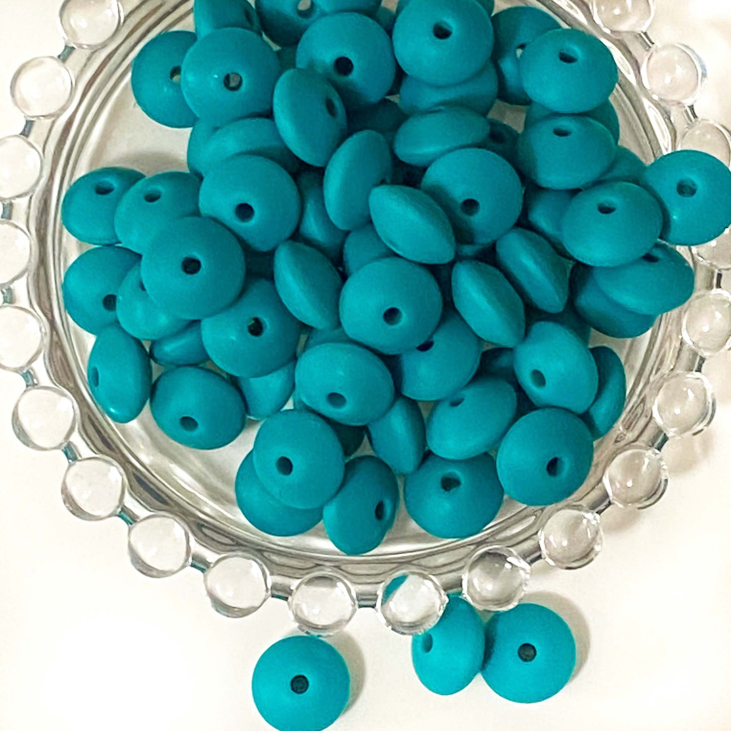 spacer spacers bean beans beads bead abacus disc thin silicone 12mm by 7mm flattened disk small soft uk cute kawaii craft supplies crafts shop store making beaded pen pens jewellery make bright strong orange deep purple dark green blue peacock teal 