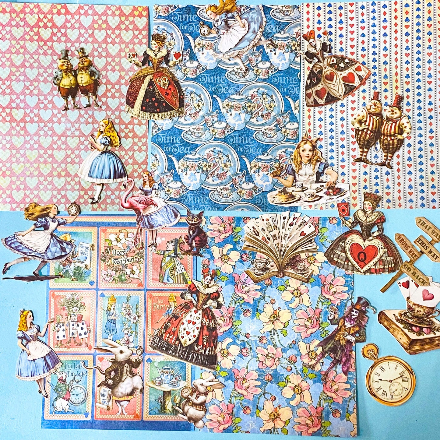 alice in wonderland ephemera sticker pack with scrapbook papers, die cut card stickers in a tea party theme with the write rabbit, queen of hearts, alice and cheshire cat decals