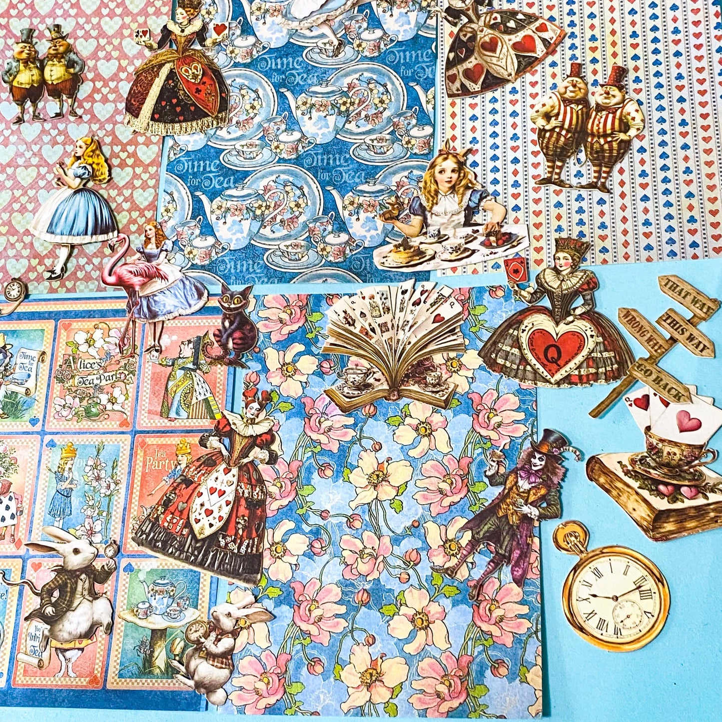 alice in wonderland ephemera sticker pack with scrapbook papers, die cut card stickers in a tea party theme with the write rabbit, queen of hearts, alice and cheshire cat decals