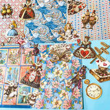 alice in wonderland ephemera sticker pack with scrapbook papers, die cut card stickers in a tea party theme with the write rabbit, queen of hearts, alice and cheshire cat decals