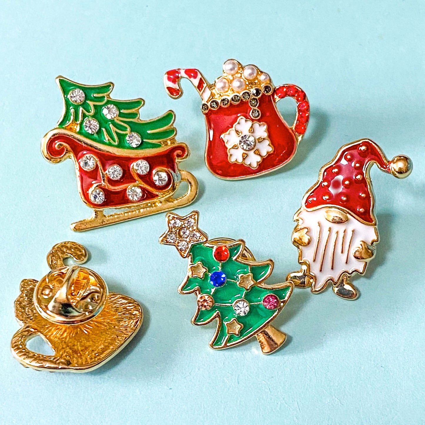 brooch brooches pin pins badge christmas festive sparkly rhinestone enamel enamelled gold golden metal pearl pearly pearls sledge sleigh gnome gonk gnomes tree trees hot chocolate mug cocoa red green uk cute kawaii stocking filler fillers gift gifts shop store
