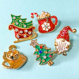 brooch brooches pin pins badge christmas festive sparkly rhinestone enamel enamelled gold golden metal pearl pearly pearls sledge sleigh gnome gonk gnomes tree trees hot chocolate mug cocoa red green uk cute kawaii stocking filler fillers gift gifts shop store