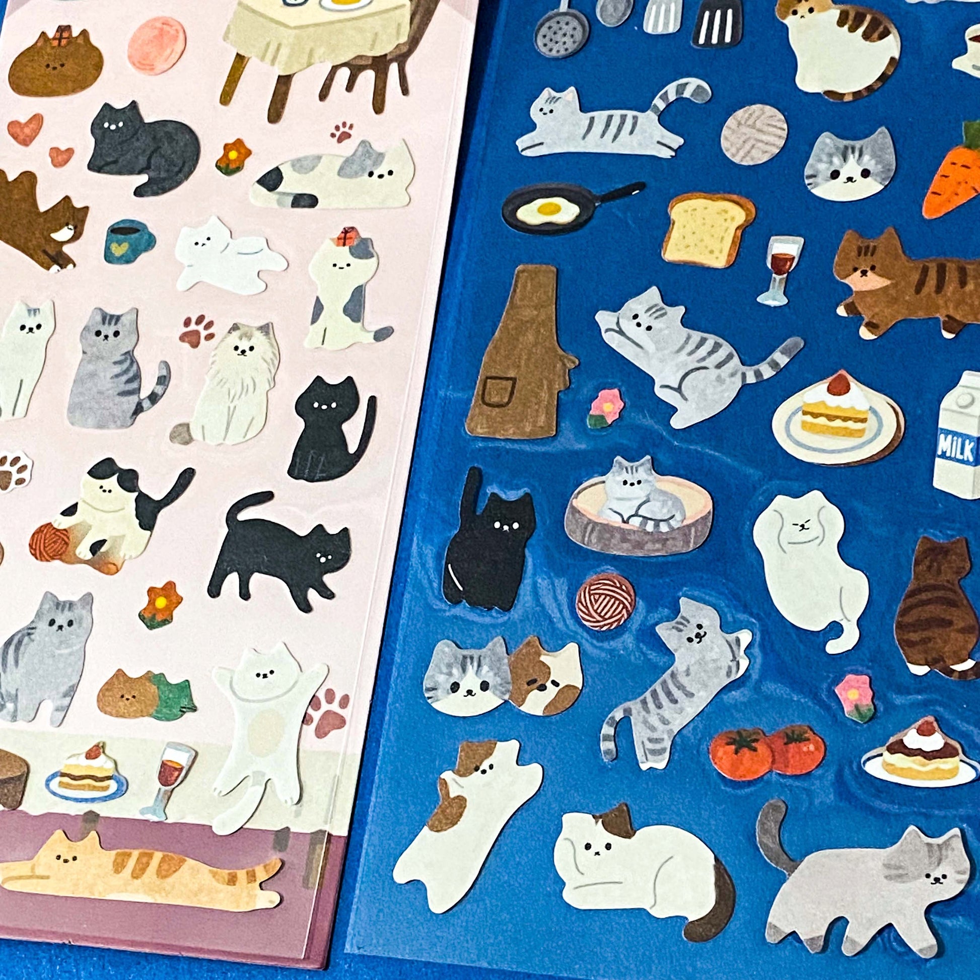 the secret life of cats matte clear sticker PET pack of 2 sheets featuring cosy illustrated cats and home scenes. Choose from the blue sitting room, the moonlit music room or the little cat cafe. UK stationery shop.