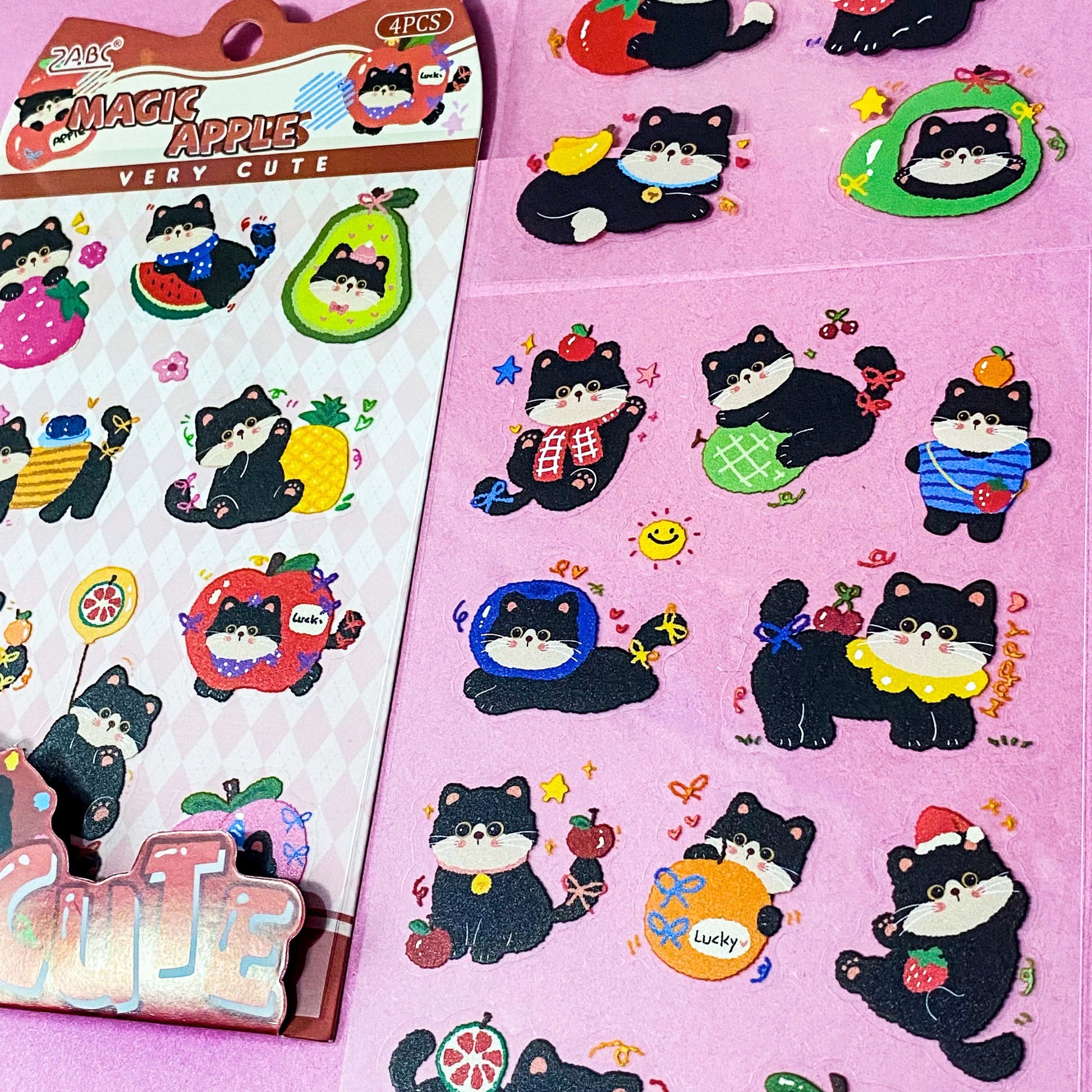 tuxedo black and white cat kawaii cartoon cats matte PET sticker packs of 4 sheets with colourful cute designs including summer holiday, christmas, party and fruits. uk stationery shop.