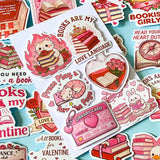set of 52 stickers, book themed holographic stickers with pink and red designs featuring books, reading, animals , flowers and romantic bookish quotes 