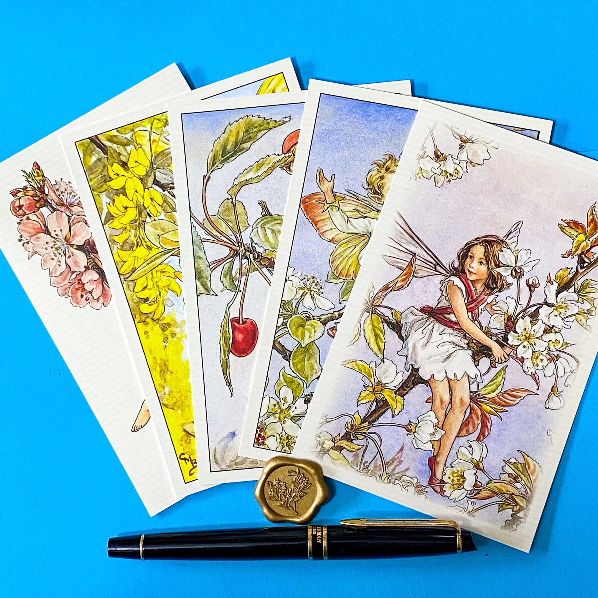 vintage flower fairy postcards with Spring blossoms including cherry tree, pear, laburnum and almond flowers. Presented in kraft belly band with wax seal sticker so makes beautiful uk letterbox gift.