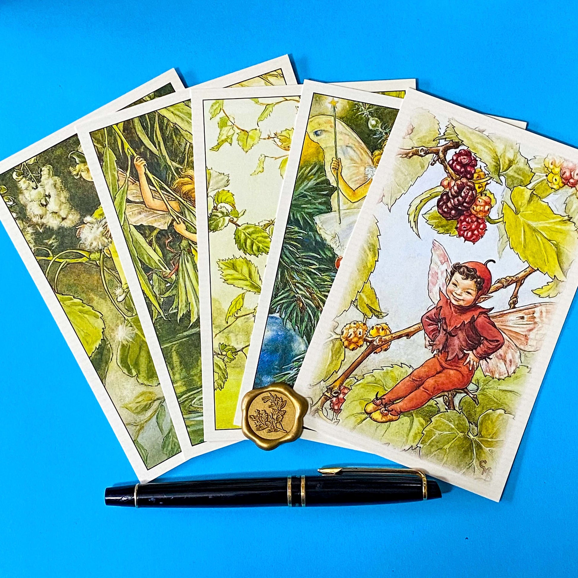 gift set of 5 cecily may barker flower fairy postcards with tree designs including elm, poplar, willow, Christmas tree and Mulberry. Packed n kraft belly band and wax seal sticker. Uk letterbox gifts in vintage retro style.