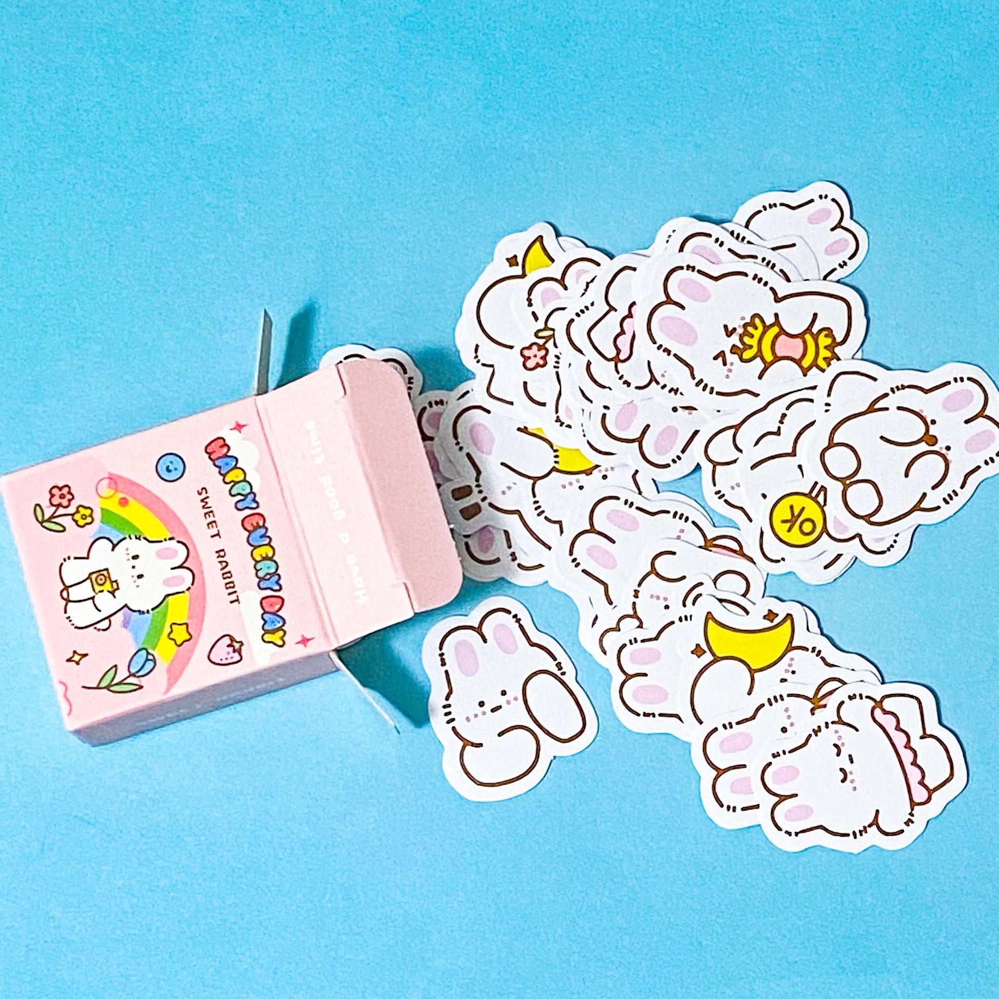 kawaii spring rabbit stickers in a mini box on a blue background