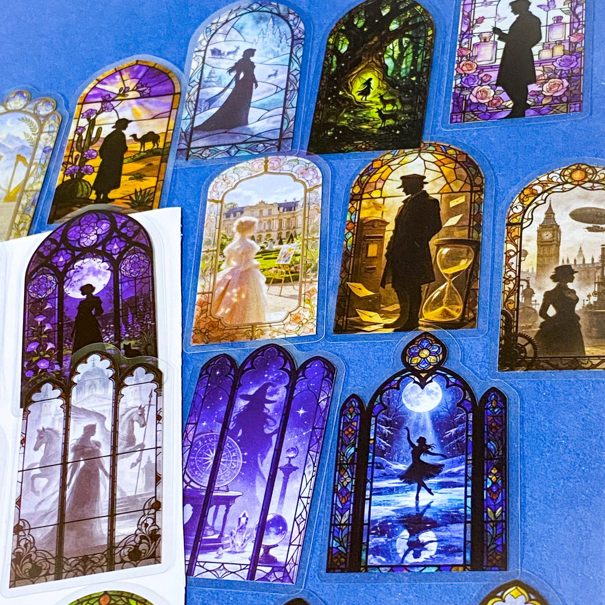50 different storybook fairytale stained glass window stickers PET clear plastic. Scenes include fairies, witches, mermaids, castles, forests, pirates, enchanted  magical forests and oceans. uk sticker shop gift set.
