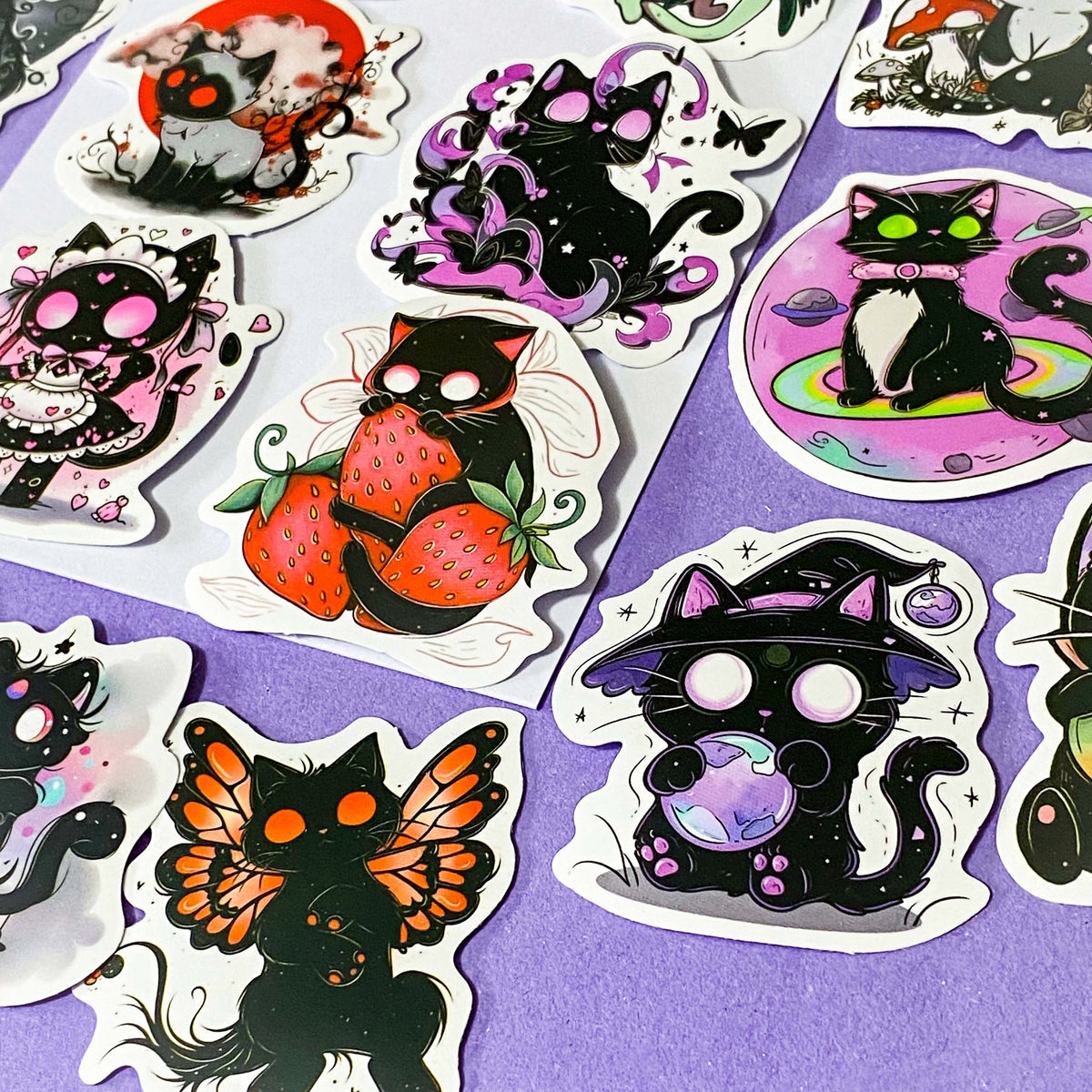 50 different kawaii matte paper cat stickers featuring magical black cats, witches, potions, mushrooms, moons, planets, strawberries, spell books, cute fantasy night time illustrations. uk sticker gift shop.
