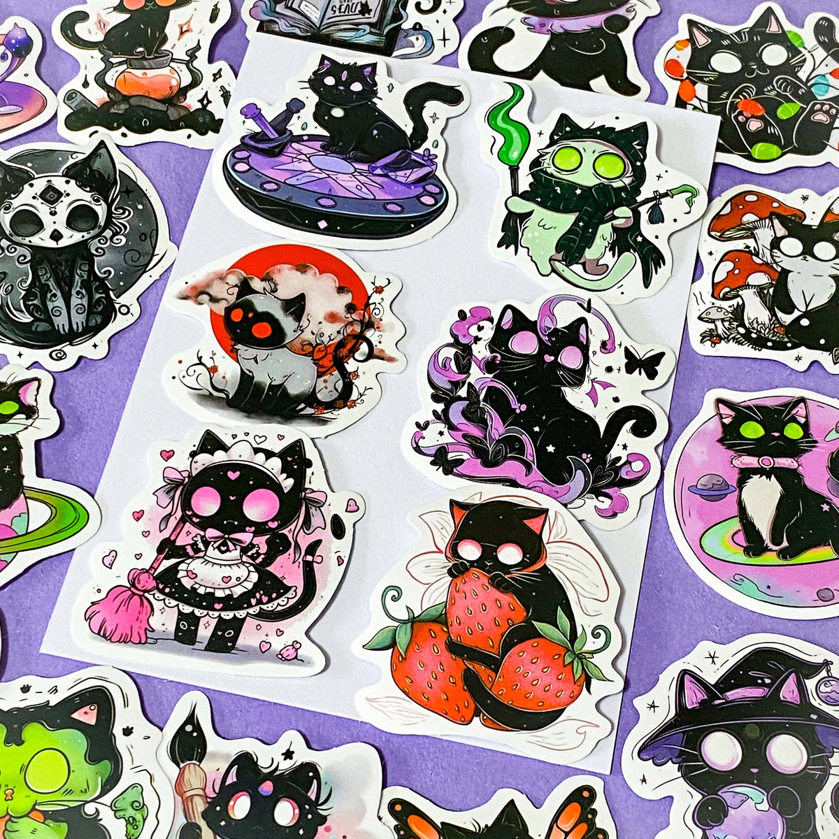 50 different kawaii matte paper cat stickers featuring magical black cats, witches, potions, mushrooms, moons, planets, strawberries, spell books, cute fantasy night time illustrations. uk sticker gift shop.