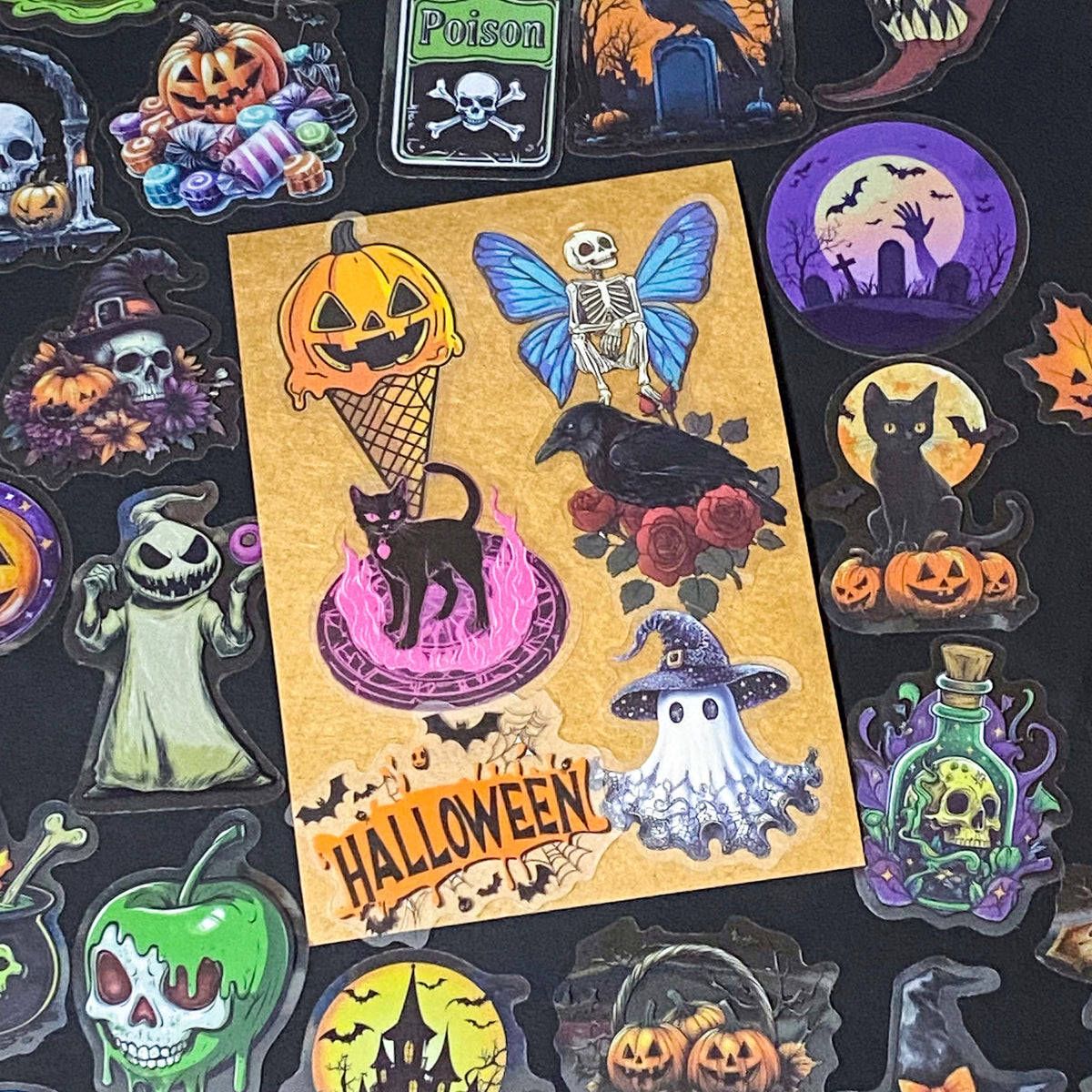 50 different halloween pET STICKERS UP TO 67MM, FEATURING PUMPKINS, GHOSTS, SKELETONS, BLACK CATS, RAVENS, POTIONS, SPOOKY GOTHIC ILLUSTRATIONS. Uk cute stationery gift shop. purple, orange and black.