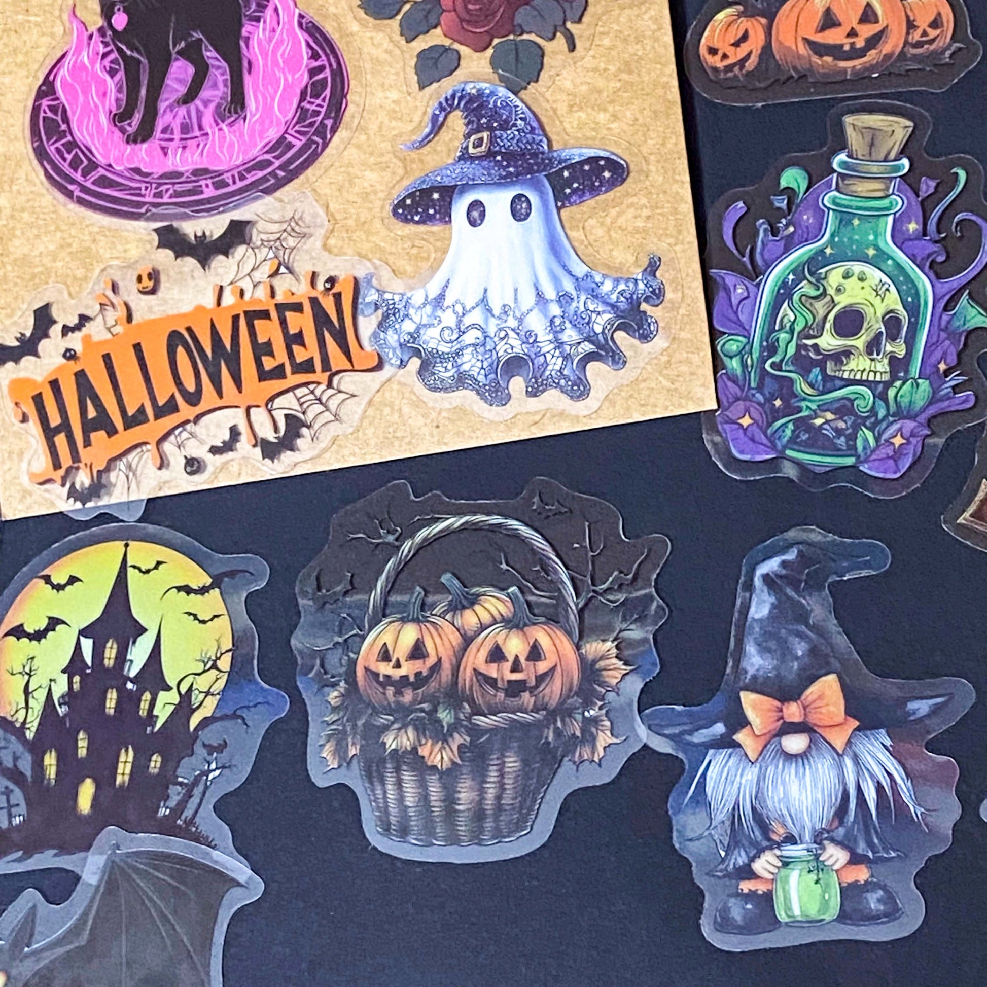50 different halloween pET STICKERS UP TO 67MM, FEATURING PUMPKINS, GHOSTS, SKELETONS, BLACK CATS, RAVENS, POTIONS, SPOOKY GOTHIC ILLUSTRATIONS. Uk cute stationery gift shop. purple, orange and black.