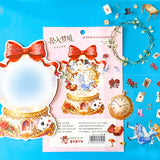 large alice inspired falling into wonderland sticker set with oversized now globe scene card, transparent PET stickers, pocket watch, roses and playing cards details on pink backing card with bow