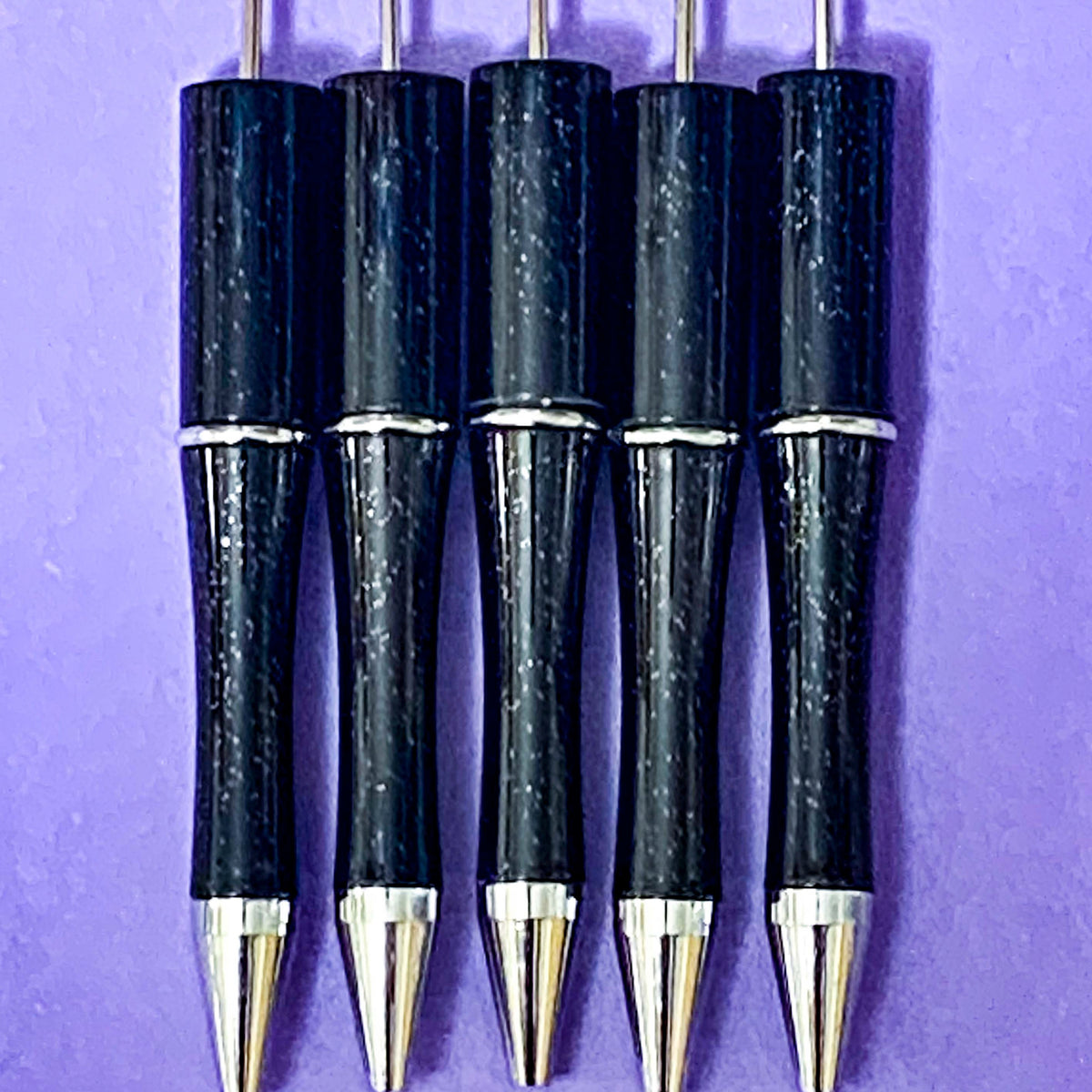 halloween pen base blank for making beaded pens in ombre glitter grey and black, glittery black, foil magenta purple and spooky foiled green turquoise. uk craft shop for autumn projects. black ink with refills.