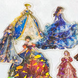 pack of 30 holographic princess stickers with gold foil outlines featuring elegant dancing princesses, castle scenes and fantasy ball gowns on transparent pet plastic clear material. uk cute stationery shop. storybook sticker set.
