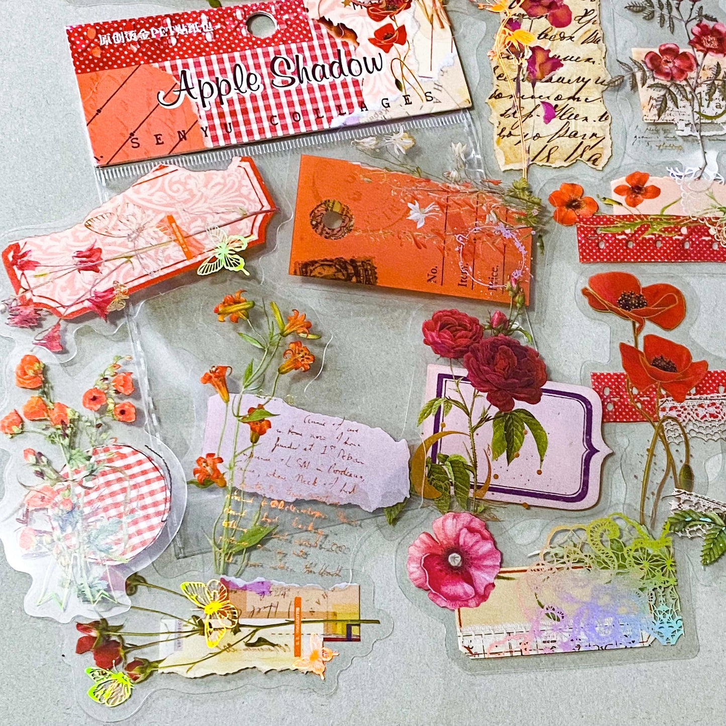 apple shadow vintage floral PET sticker pack featuring pink and red velvet roses, orange poppies, lace details, labels and botanical collage elements with gold holo foil accents. uk cute stationery and sticker shop.