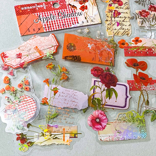 apple shadow vintage floral PET sticker pack featuring pink and red velvet roses, orange poppies, lace details, labels and botanical collage elements with gold holo foil accents. uk cute stationery and sticker shop.