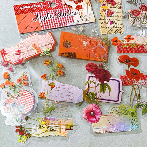 apple shadow vintage floral PET sticker pack featuring pink and red velvet roses, orange poppies, lace details, labels and botanical collage elements with gold holo foil accents. uk cute stationery and sticker shop.