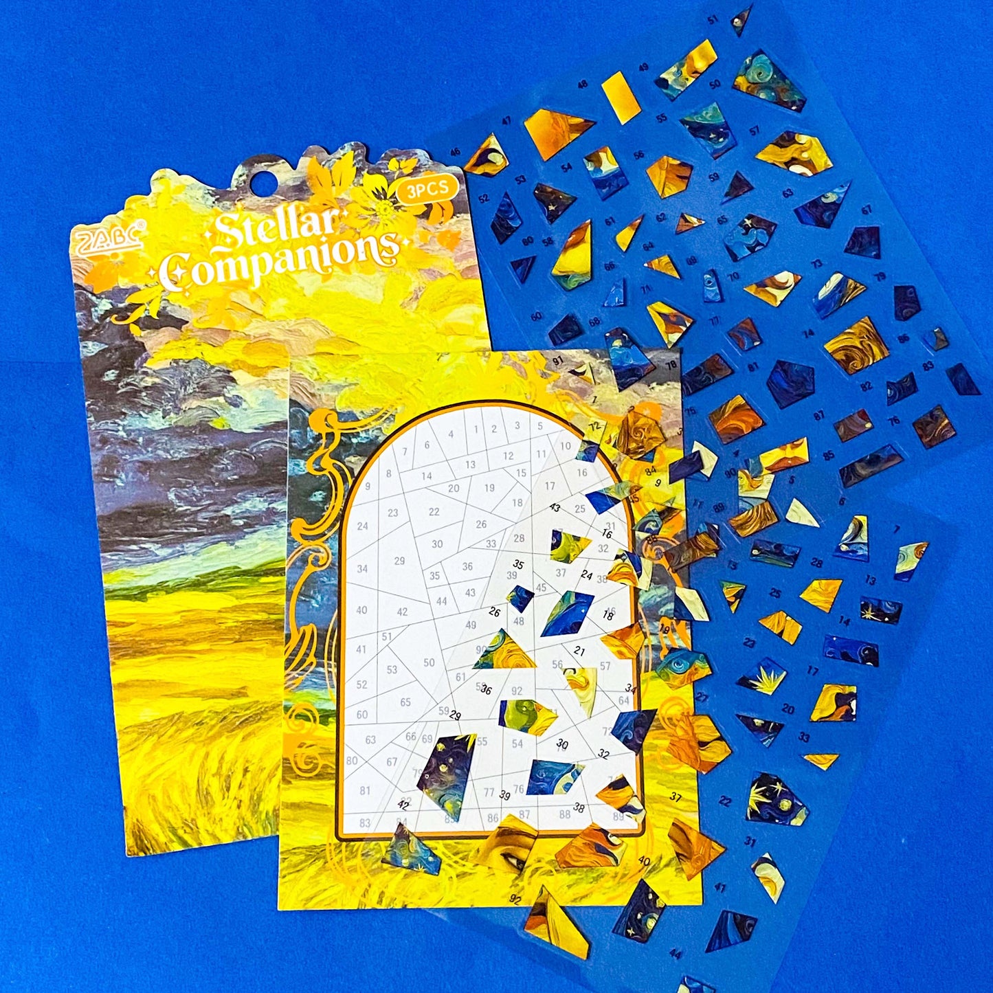 soul guardian blue crescent moon and goddess colourful mosaic art picture kit with 2 sheets PET stickers and card base board. Mindfulness activity or gift. Blue, gold, yellow design in art nouveau inspired style.