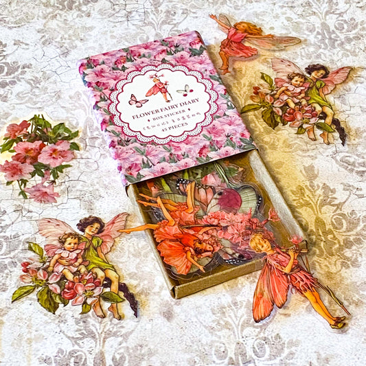 kraft box of 45 vintage flower fairy stickers with flowers, blossoms, butterflies and fairies clear plastic stickers in pretty pink and peach shades