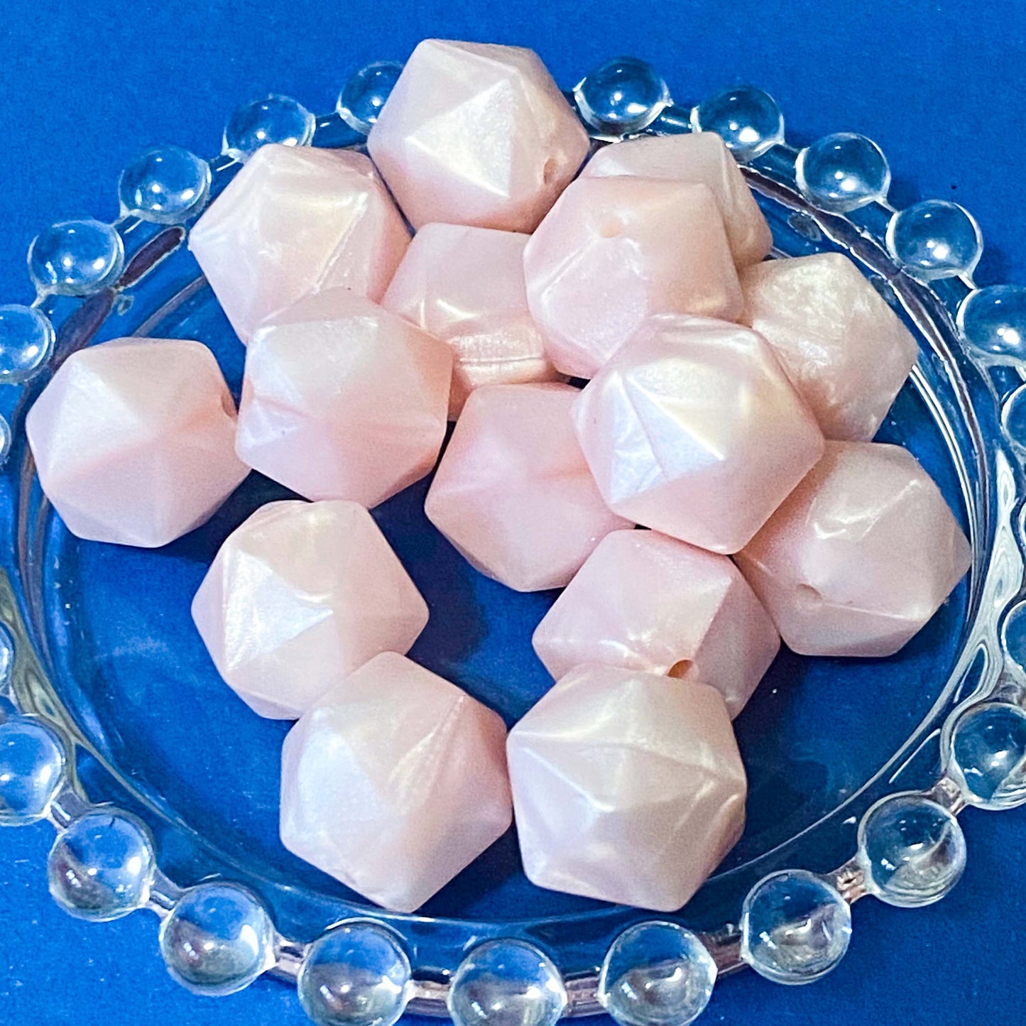 light pink pearly silicone beads 20mm with 2mm hole and soft touch. large multi sided pink coloured pearlescent beads.