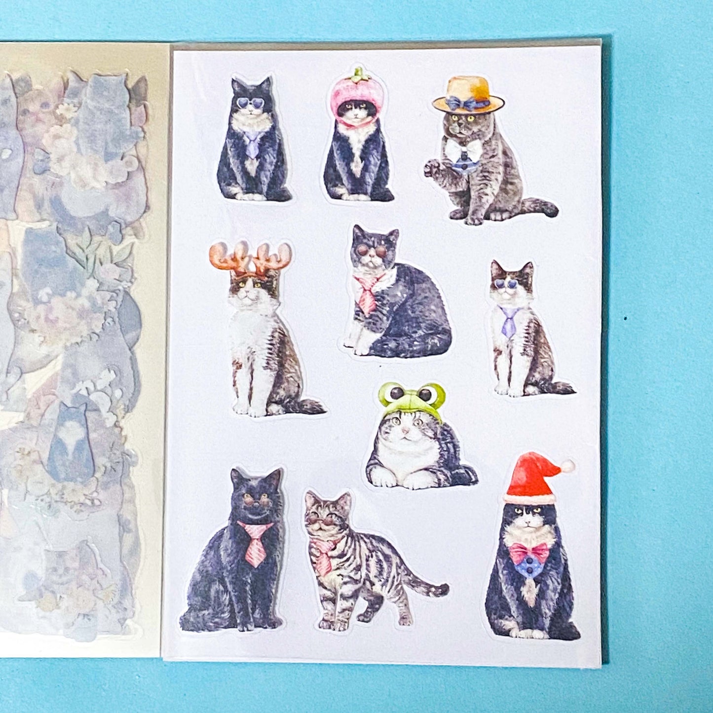 cat elf sticker book of 20 clear sheets of vintage cats and flowers pet stickers on a blue background