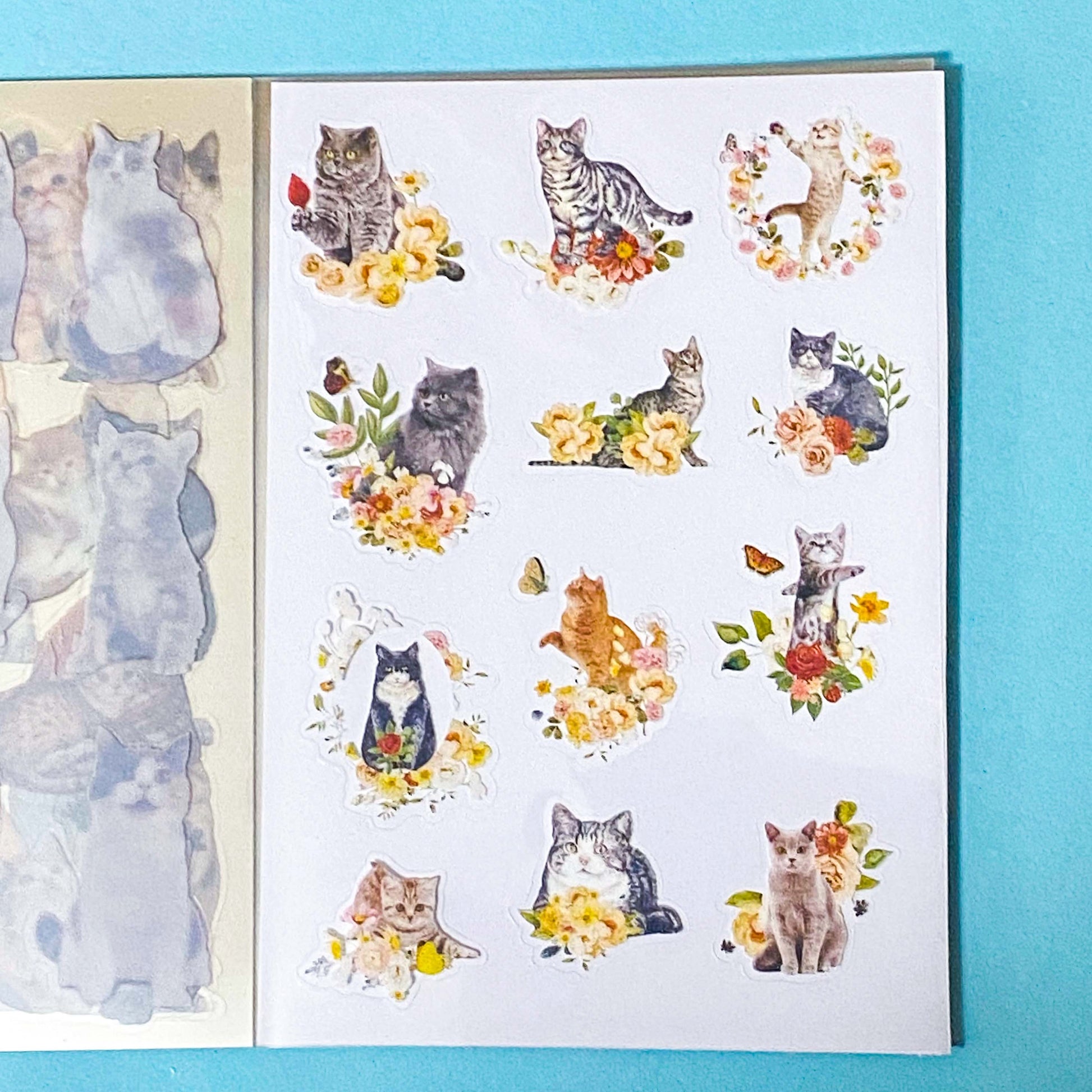 cat elf sticker book of 20 clear sheets of vintage cats and flowers pet stickers on a blue background