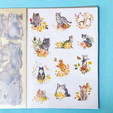 cat elf sticker book of 20 clear sheets of vintage cats and flowers pet stickers on a blue background
