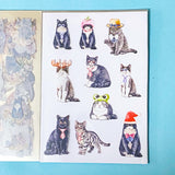 cat elf sticker book of 20 clear sheets of vintage cats and flowers pet stickers on a blue background