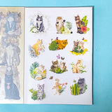 cat elf sticker book of 20 clear sheets of vintage cats and flowers pet stickers on a blue background