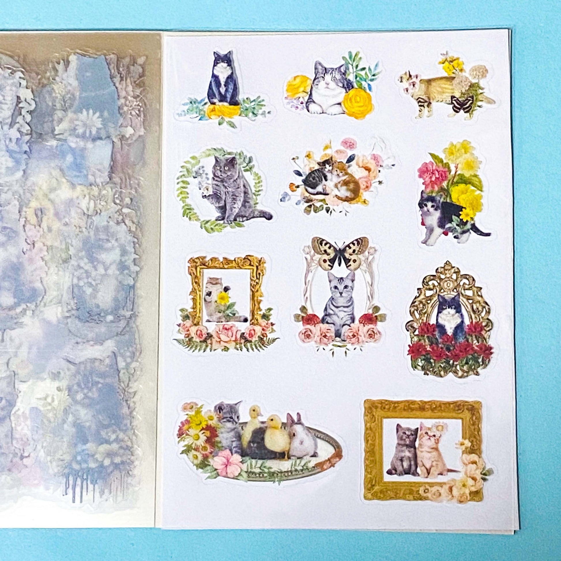 cat elf sticker book of 20 clear sheets of vintage cats and flowers pet stickers on a blue background