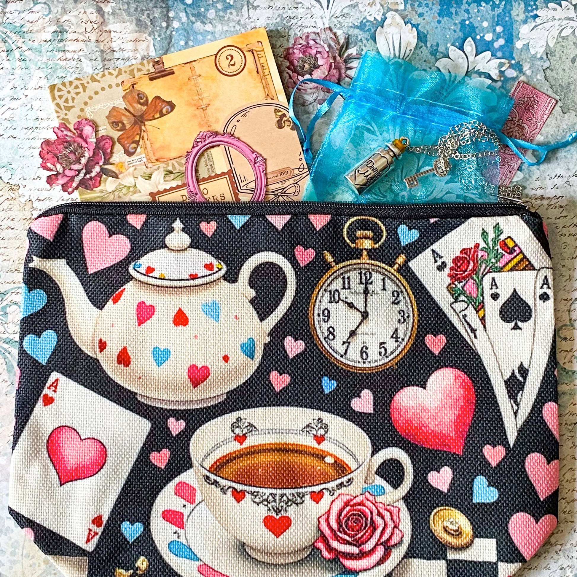 alice in wonderland time for tea stationery letterbox gift with canvas pouch, silver drink me necklace, book of clear vintage stickers and scrapbooking paper sheets