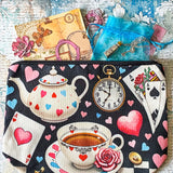 alice in wonderland time for tea stationery letterbox gift with canvas pouch, silver drink me necklace, book of clear vintage stickers and scrapbooking paper sheets