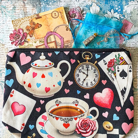 alice in wonderland time for tea stationery letterbox gift with canvas pouch, silver drink me necklace, book of clear vintage stickers and scrapbooking paper sheets