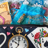 alice in wonderland time for tea stationery letterbox gift with canvas pouch, silver drink me necklace, book of clear vintage stickers and scrapbooking paper sheets