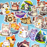 kawaii cat adventure laptop stickers pack with 50 colourful cute cartoon cat stickers on a blue background